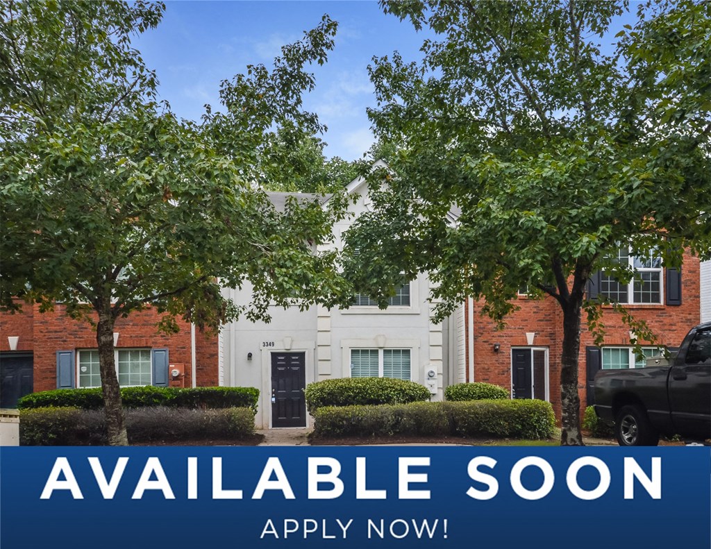 a picture of a building with trees in front of it