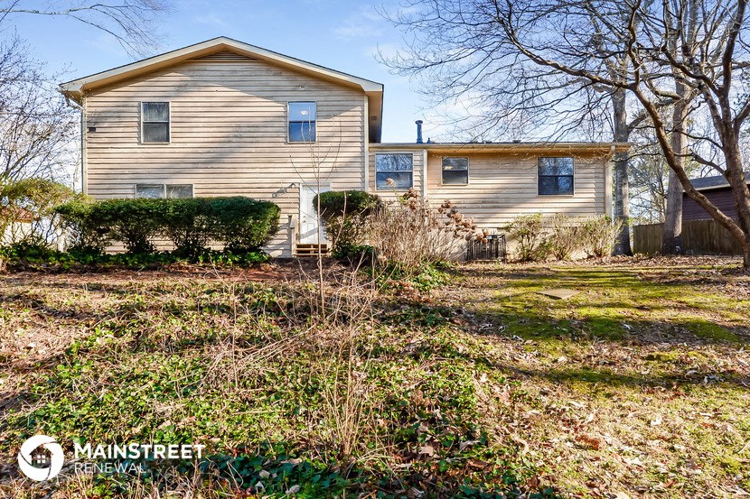 a house with a yard in front of it