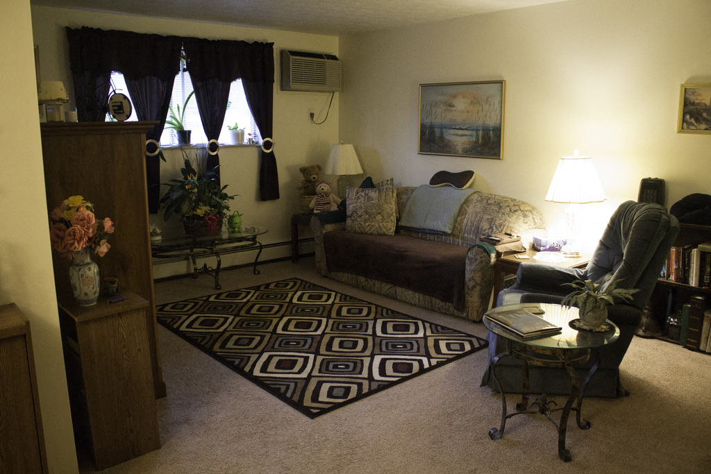 a living room with a couch and a table