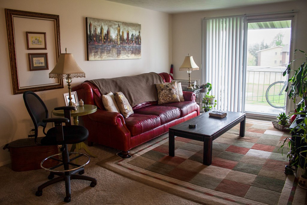 a living room with a couch and a coffee table