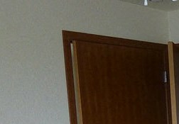 Closet Image of small closet with shelves and larger with hanger rack - Photo Gallery