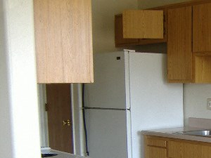 Kitchen Image of sink, refrigerator, stove, and cabinets - Photo Gallery 2