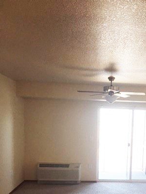 Living Room Image of open space with AC unit and fan - Photo Gallery 4