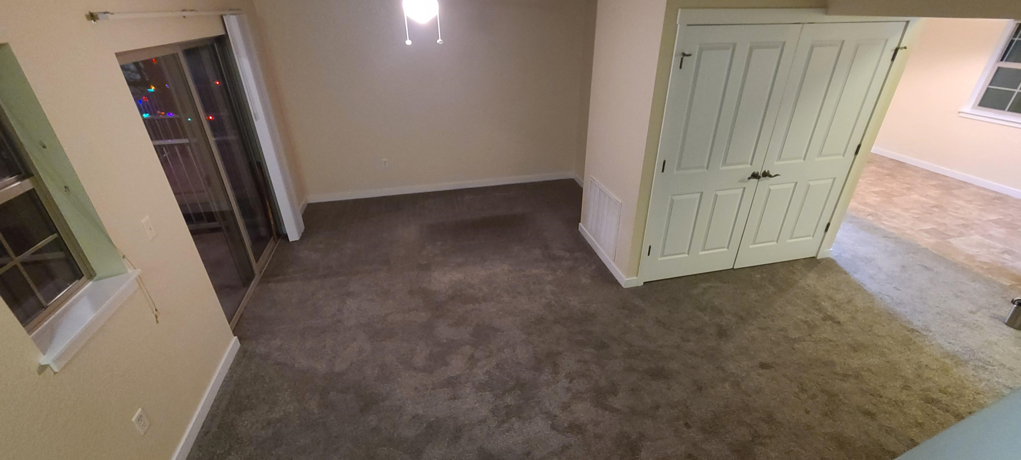 Image of living space with sliding glass doors