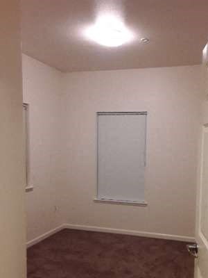 Bedroom Image of bedroom with carpet and window