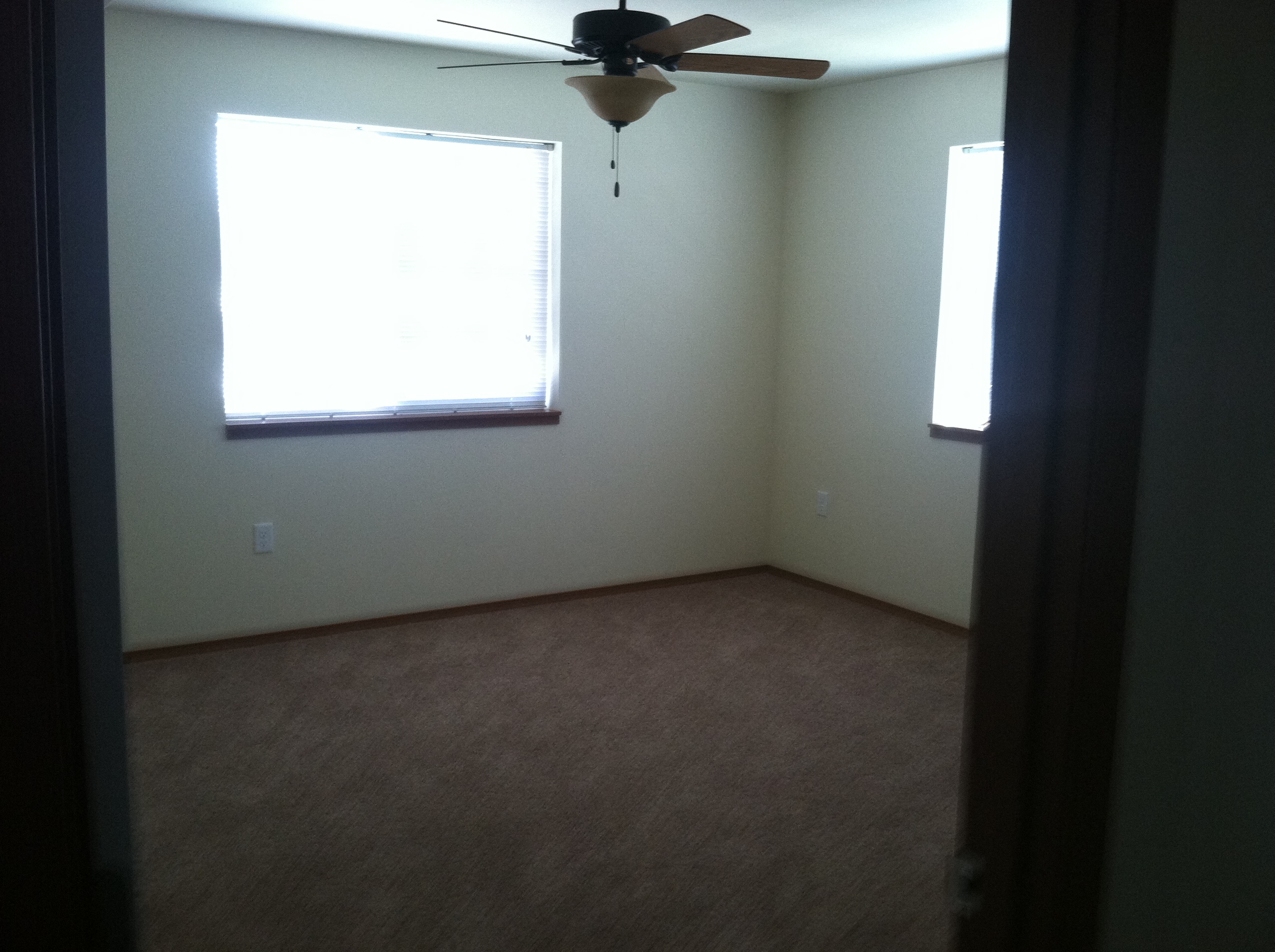 Bright Bedroom with ceiling fan