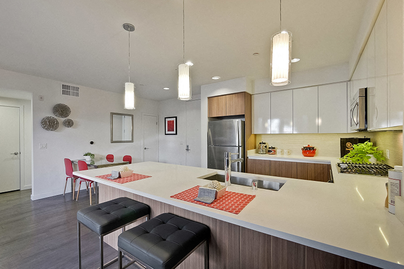 Apartments for Rent in Campbell, CA - Revere Campbell - Kitchen with Spacious Countertops, White Cabinets, and Stainless-Steel Appliances