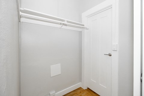 A white door is on the right side of the image.