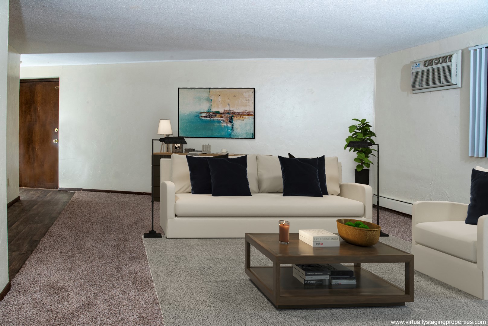 a living room with a couch and a coffee table