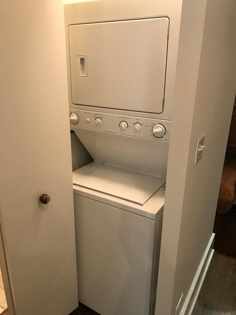 a white washer and dryer in a room