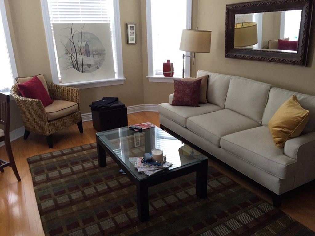 a living room with a couch and a coffee table