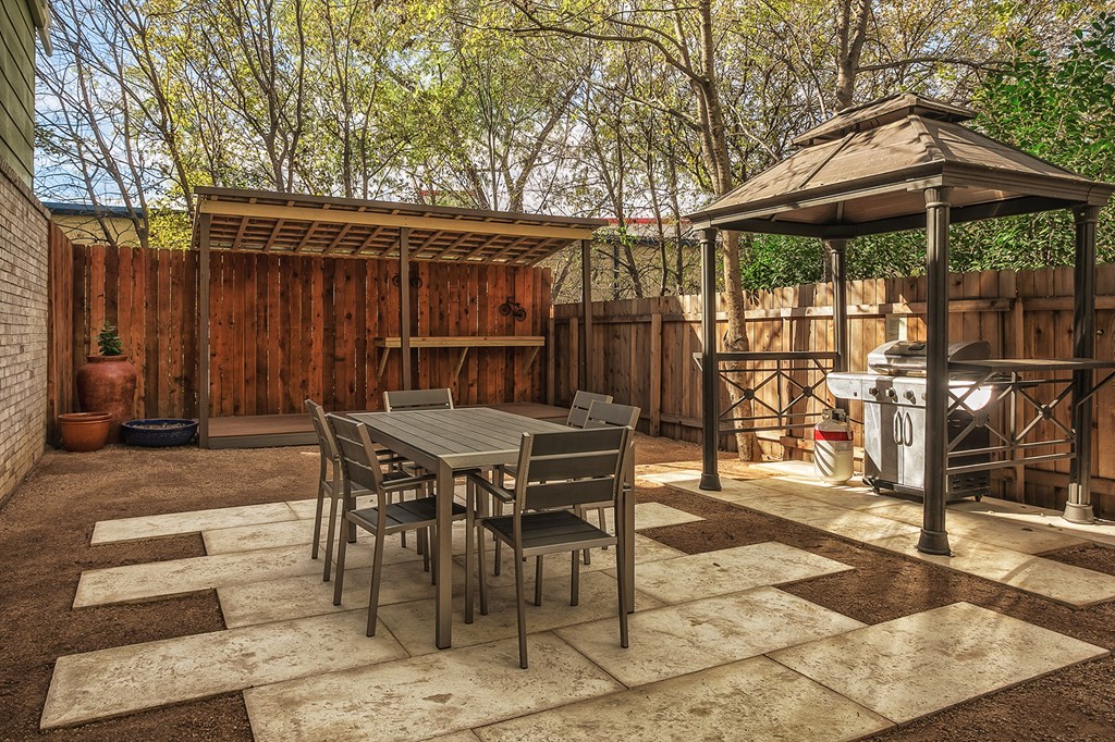 small patio with a grill for small gatherings