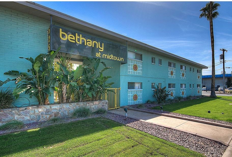 a blue building with a sign that says bethany at midtown