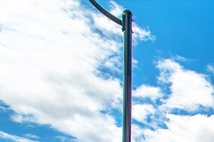 an empty sidewalk in front of a building