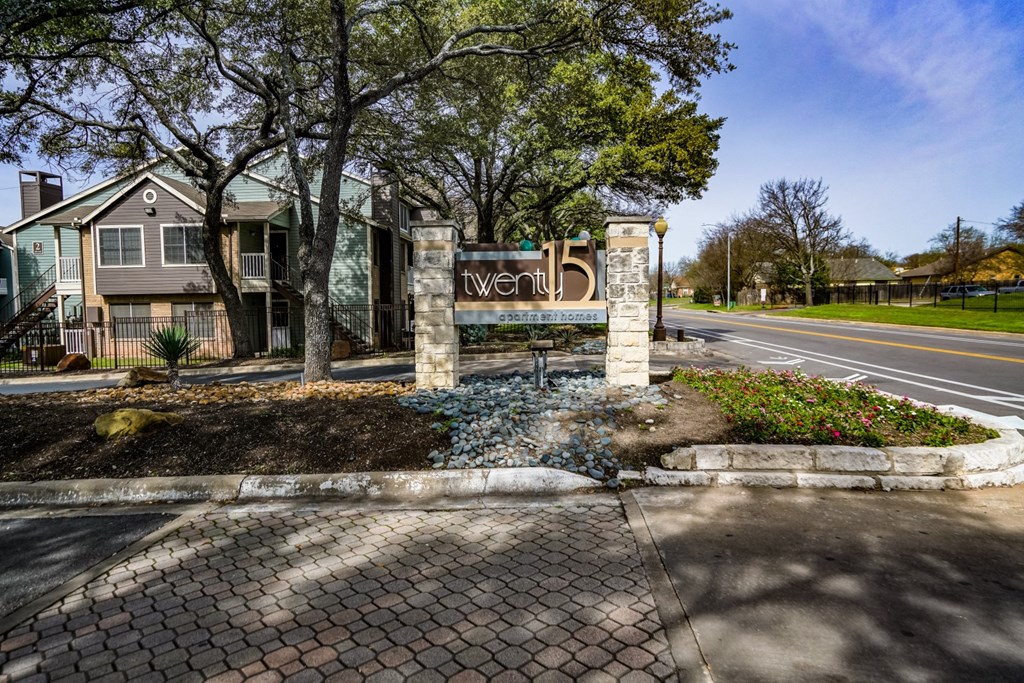 exterior shot of luxury apartments near walnut creek logo