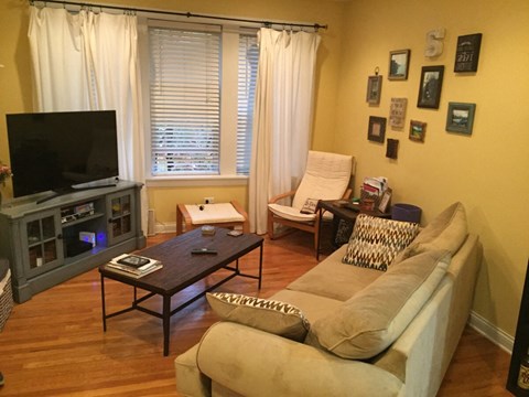 a living room with a couch and a television