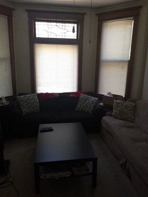 a living room with a couch and a coffee table
