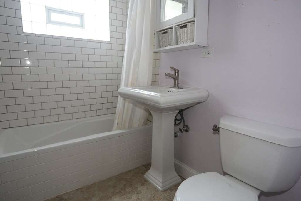 a small bathroom with a sink and a toilet
