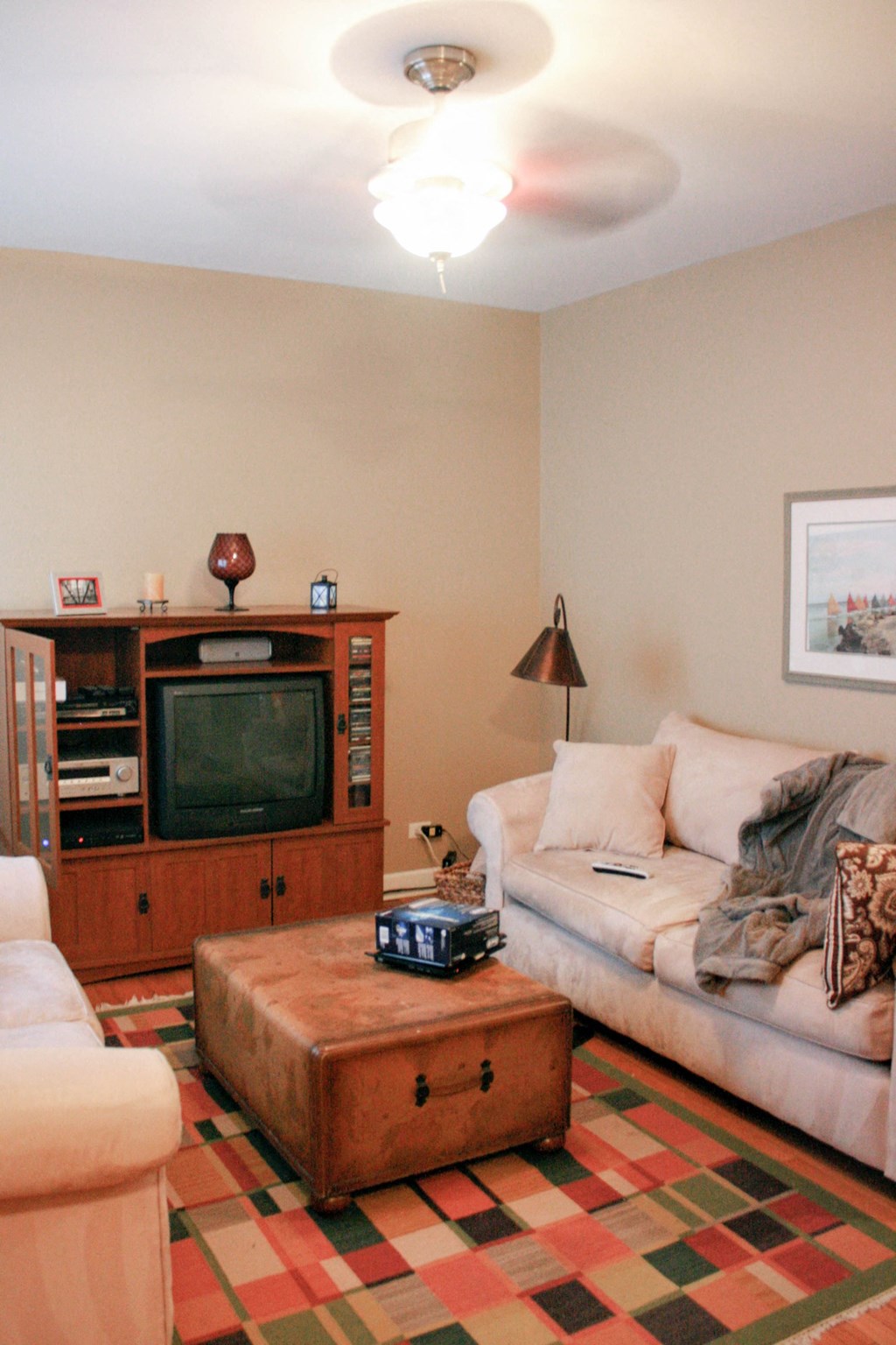 a living room with a couch and a tv