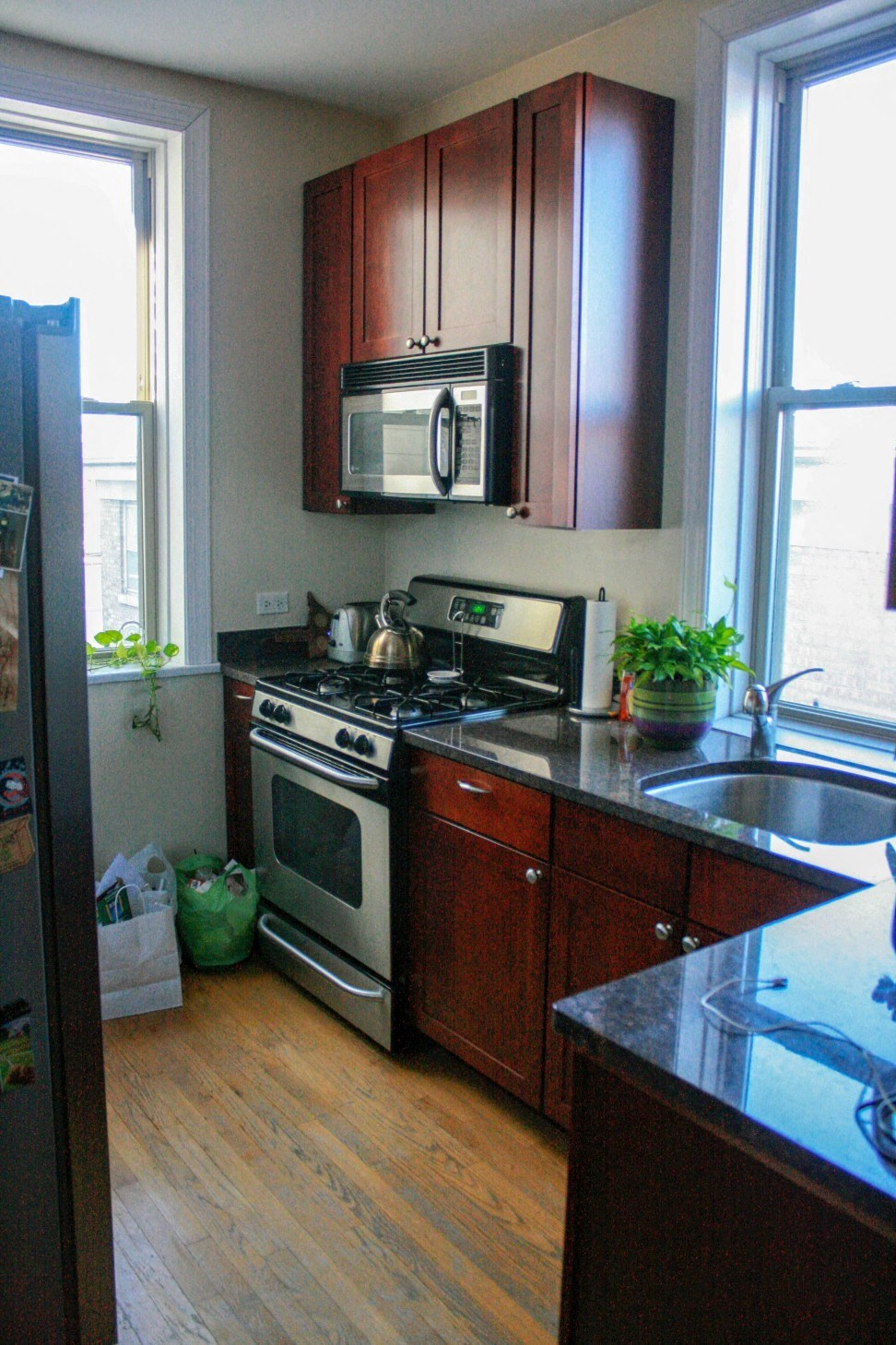 a kitchen with a stove and a microwave