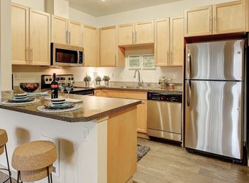 Stainless Steel Appliances, at Newberry Square Apartments, 16116 Ash Way, WA