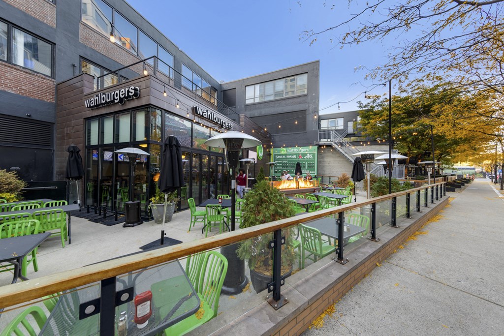 A restaurant named Wahlburgers is shown with outdoor seating.