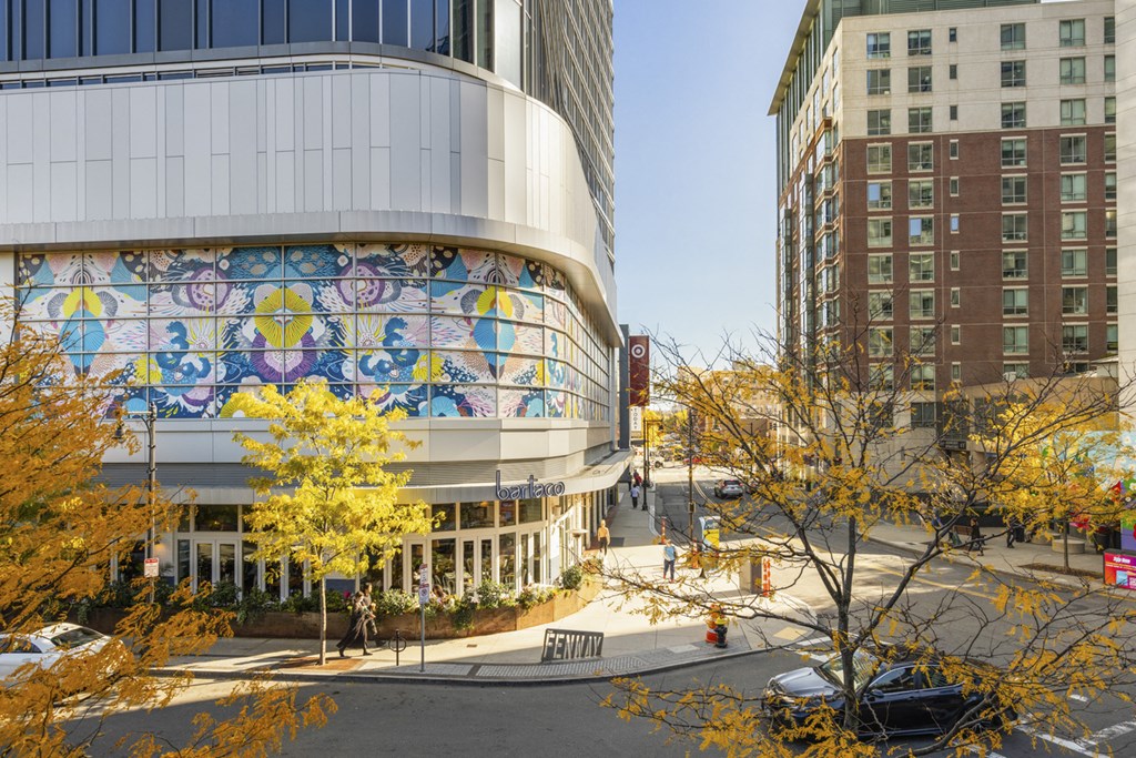 A large building with a colorful mural on its side.