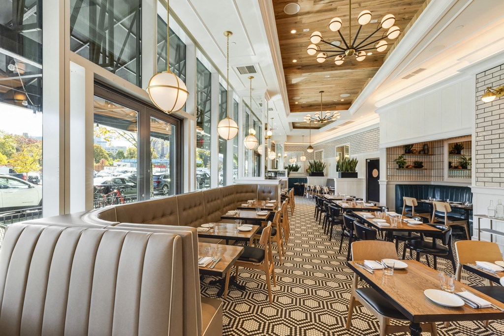 A restaurant with a black and white checkered floor.