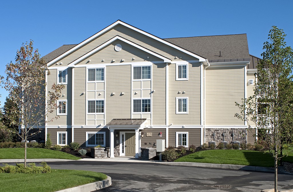 a large building with a street in front of it