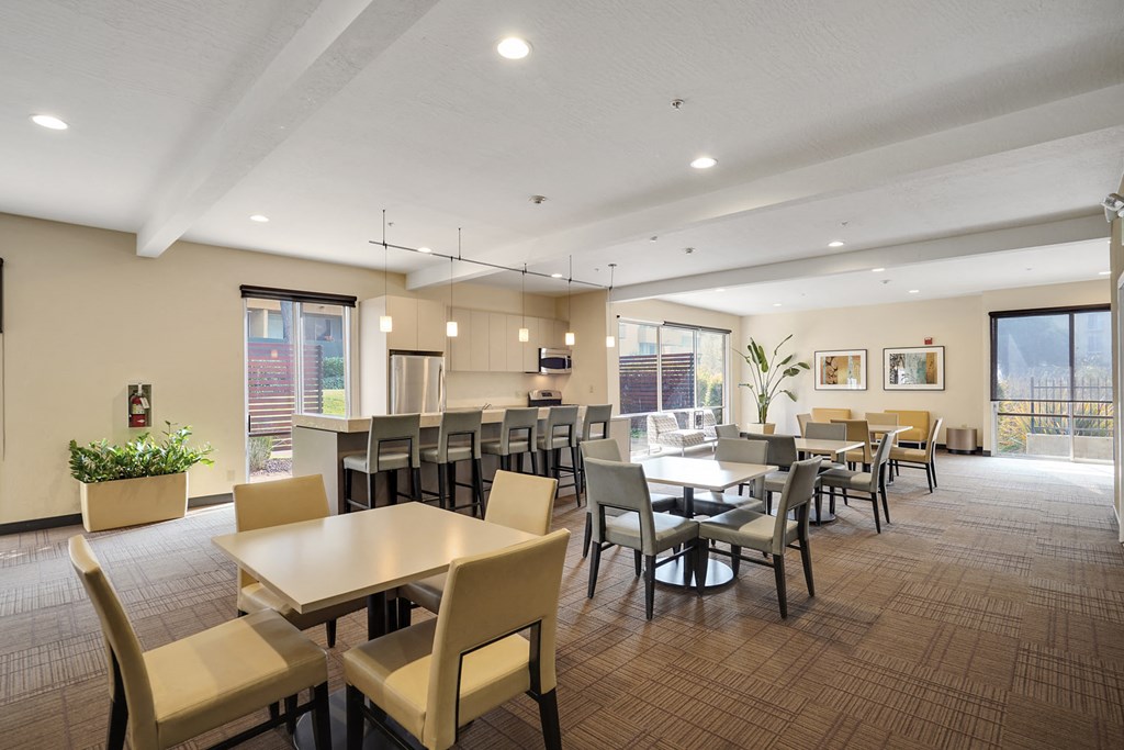 Community kitchen and seating area at Americana Apartments, Mountain View, 94040