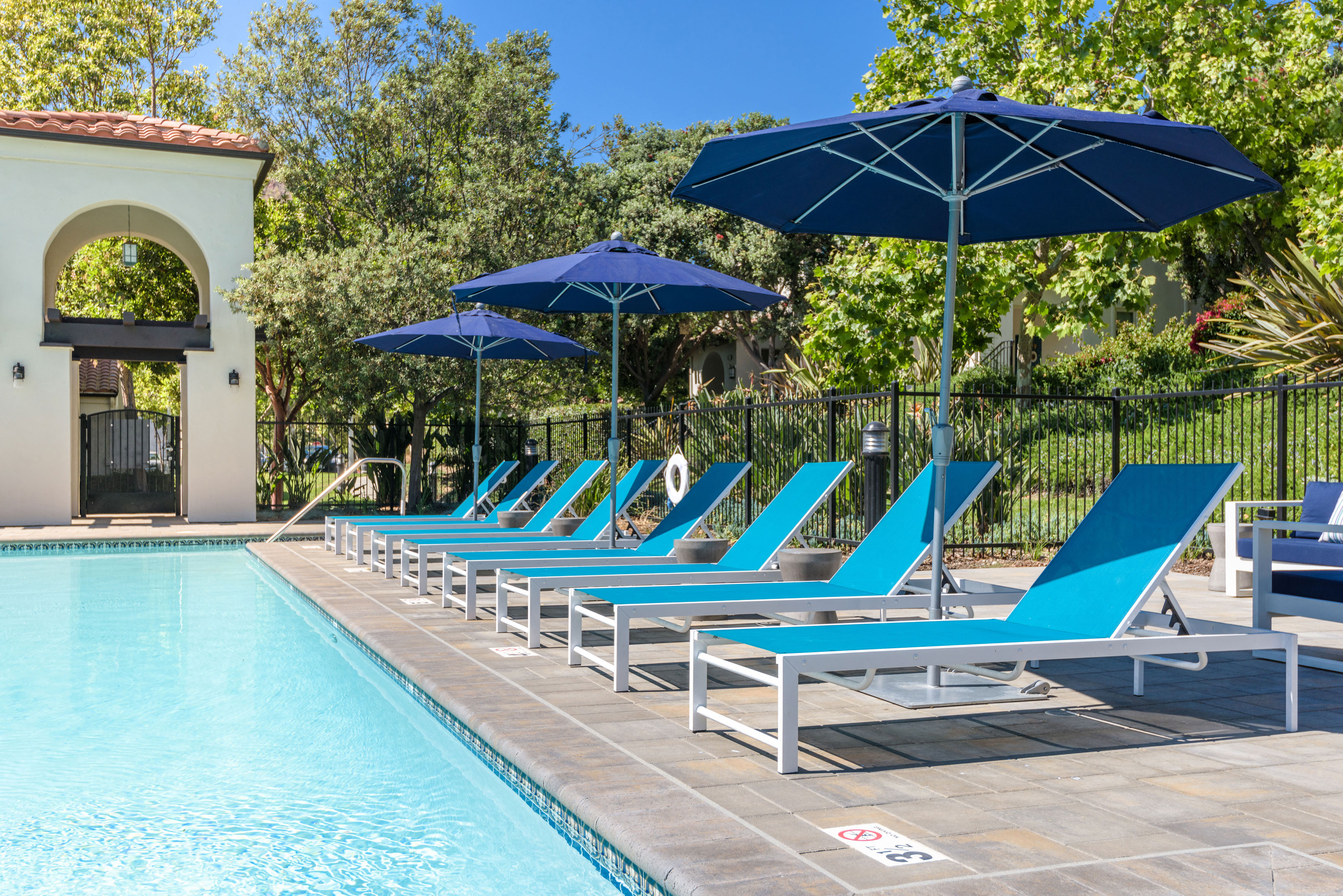 Poolside with Lounge Chairs at Mission Hills Apartment Homes