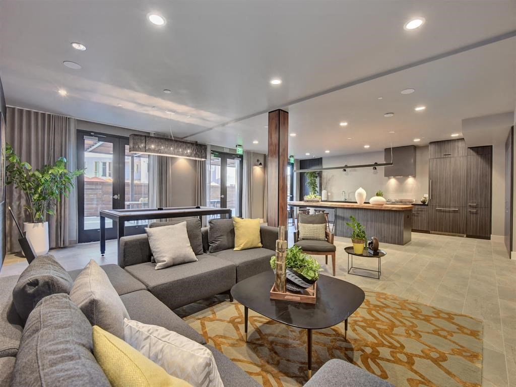 a living room with a couch and a table