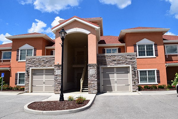 a large house with a street light in front of it