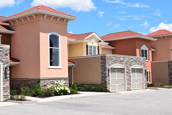 a house with a driveway and a garage door