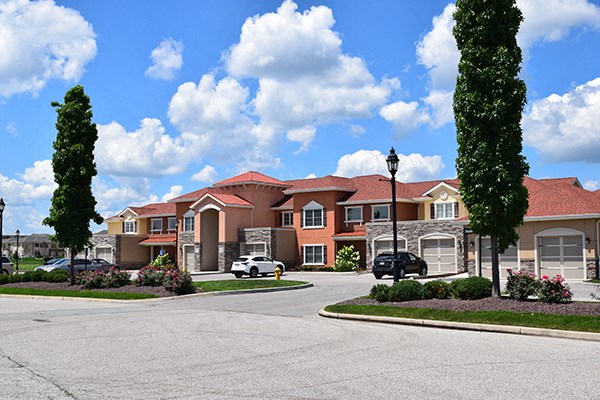a large house with a street in front of it
