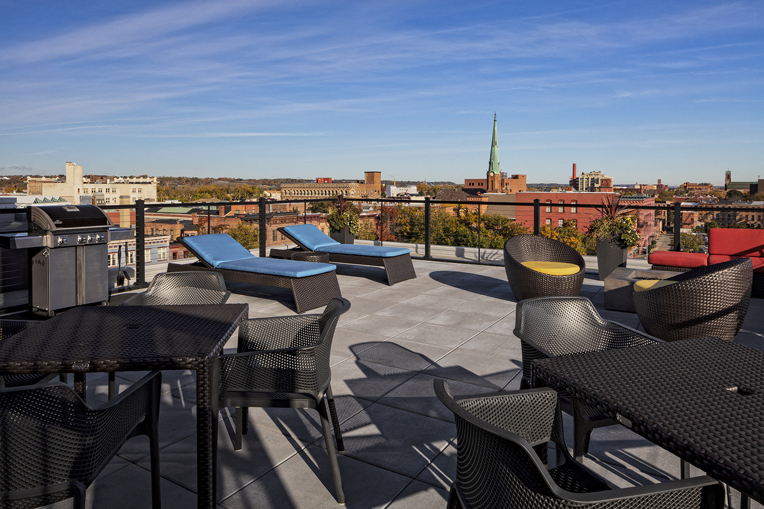 Rooftop Deck with Gas Fire Pit and Grilling Station at The News Apartments in Troy, NY