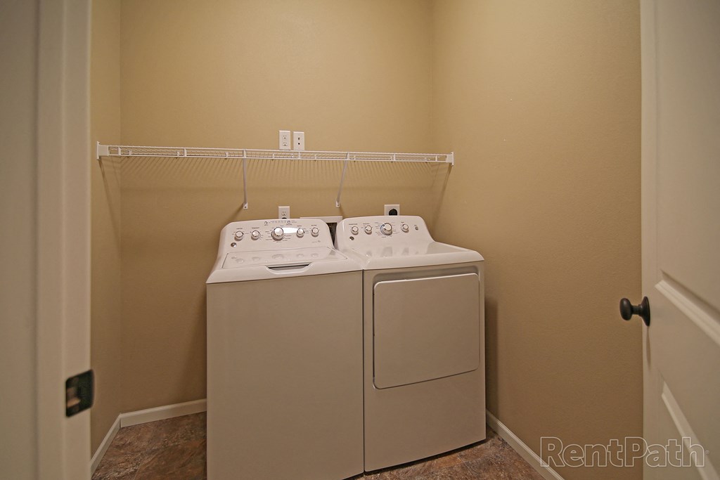 laundry room, washer and dryer  at Cascades of Mandan, North Dakota, 58554