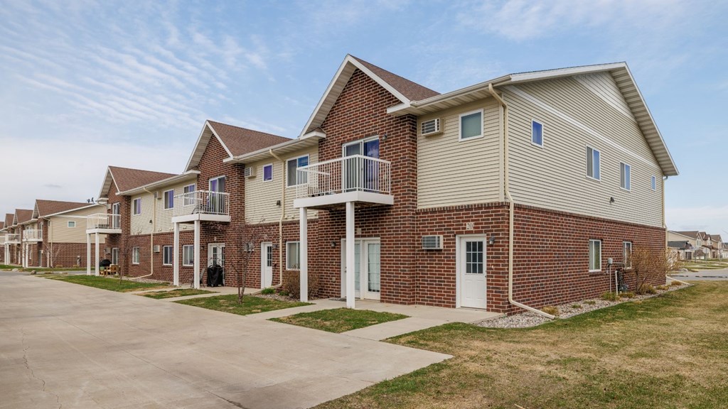 A row of houses with a clear sky above them.