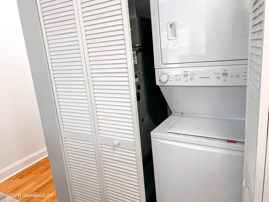 the closet has a washer and dryer in it