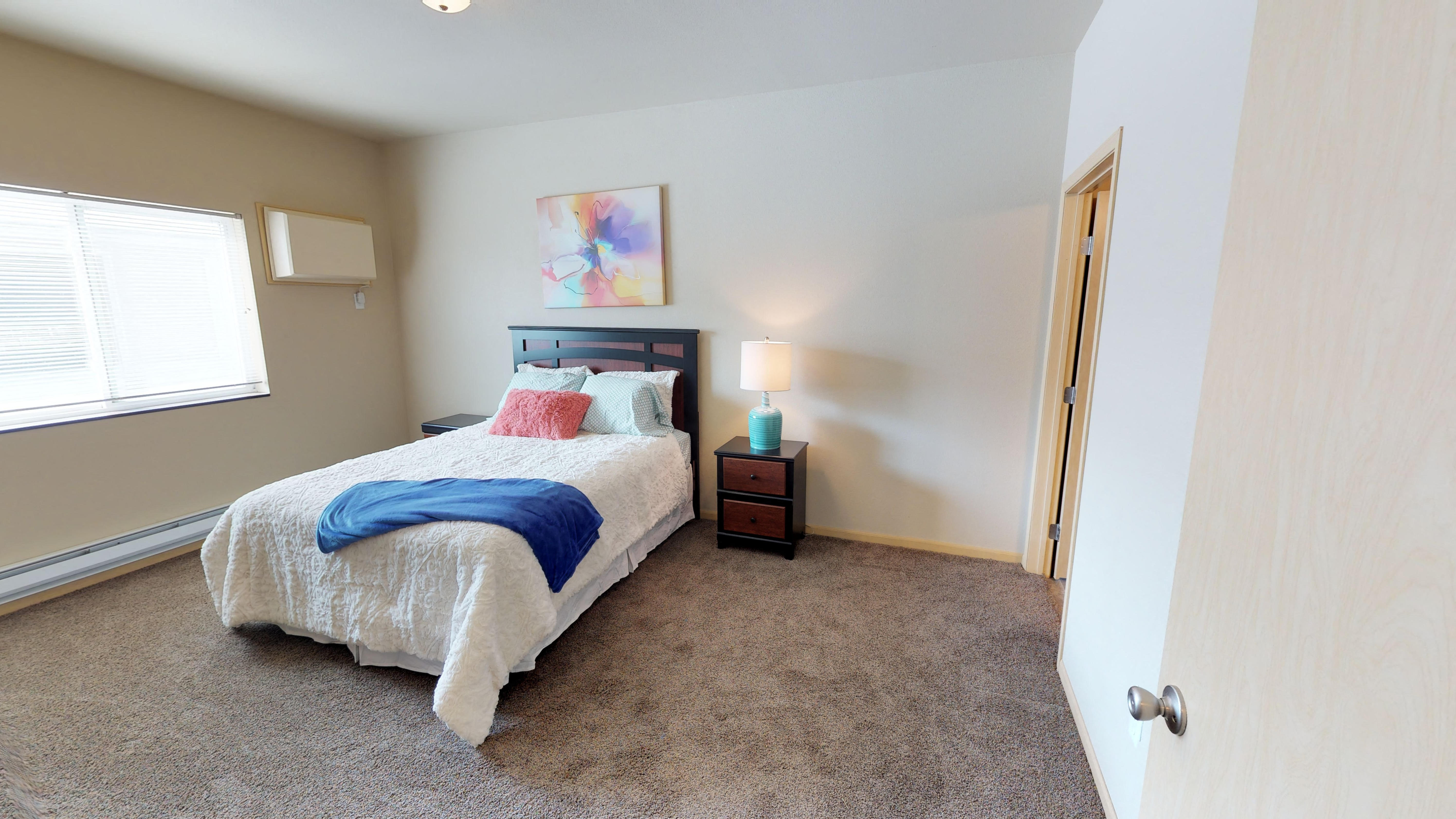 Bedroom with bed at Stonebridge Villas Apartments, North Dakota