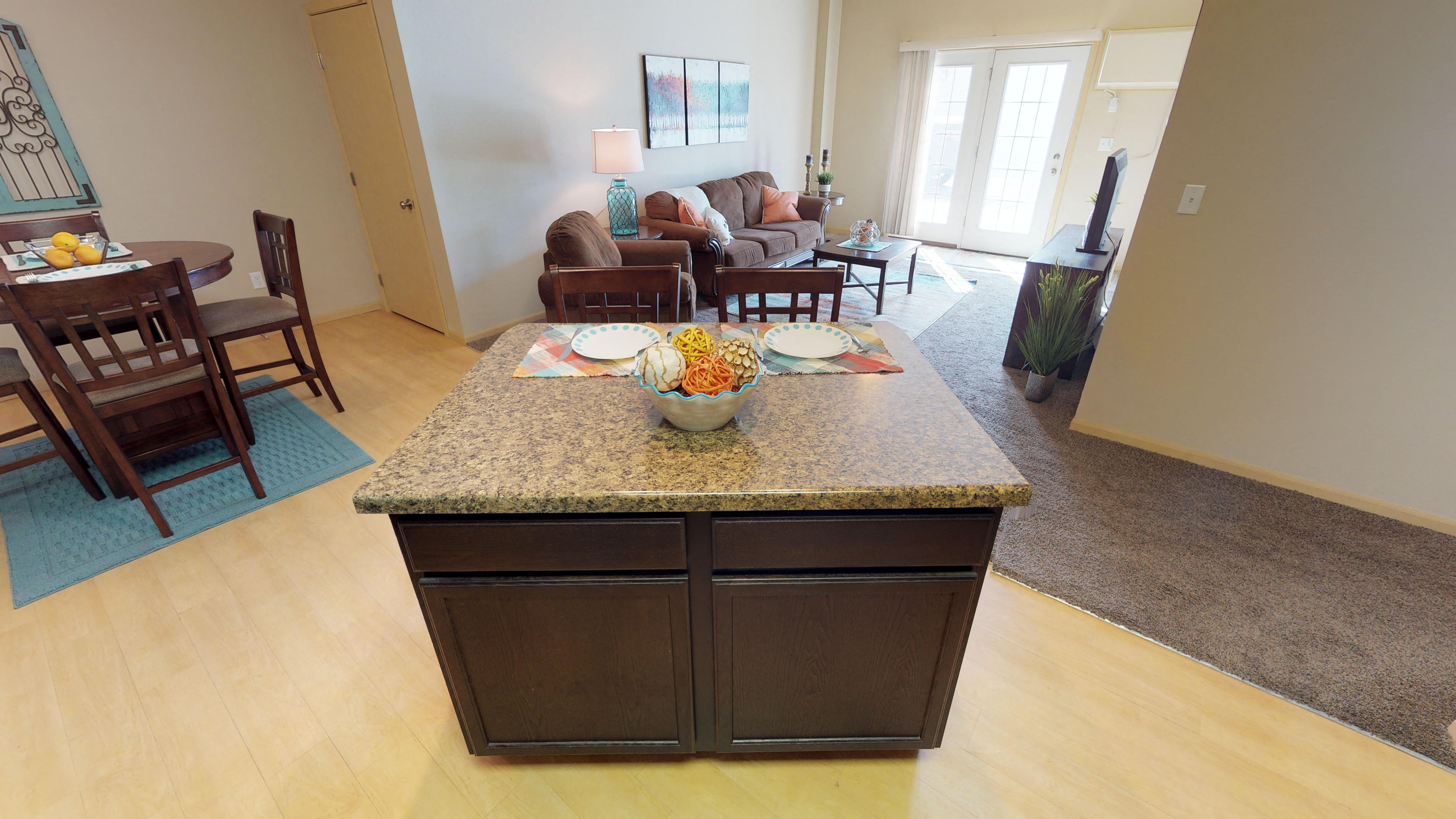 kitchen island, cabinets at Stonebridge Villas Apartments, Minot