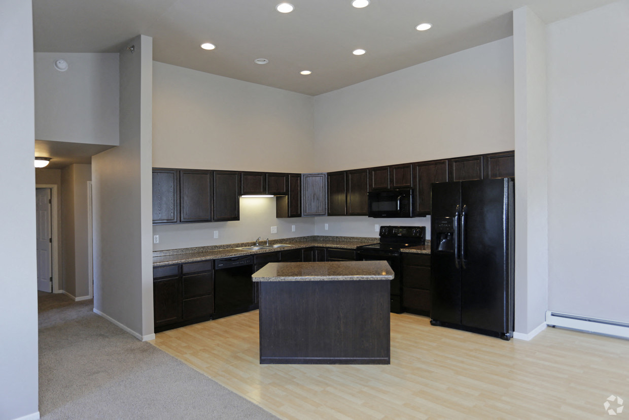 Kitchen with cabinets and appliances at Stonebridge Villas Apartments, Minot, 58703