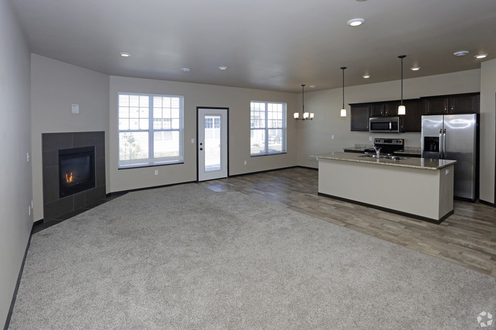 kitchen pantry, cabinets, counter, living room, gas fireplace