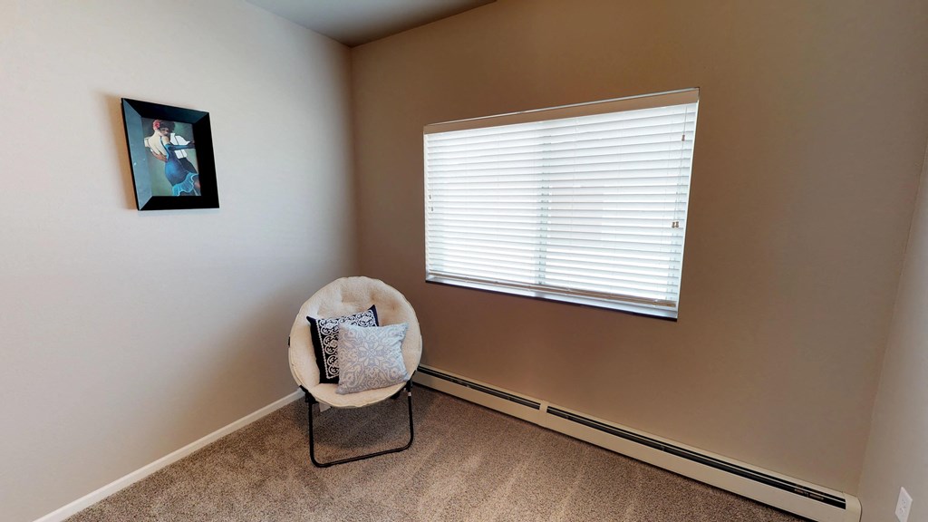 bedroom with chair and picture