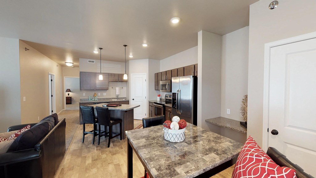 kitchen with brown cabinets, stainless steel appliances