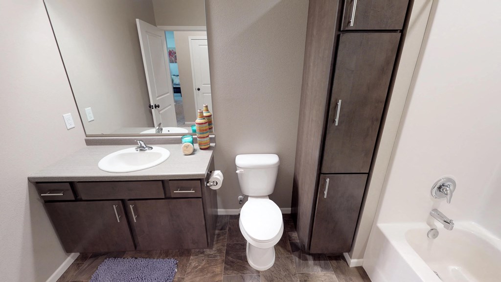 bathroom, sink, toilet, linen closet, apartment in moorhead