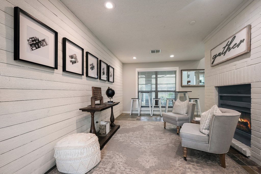living room with white sofas