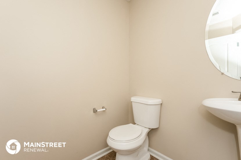 a small bathroom with a toilet and a sink