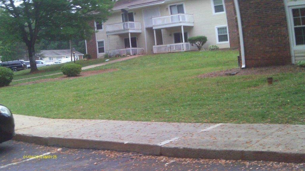 Back view of apartments with patios and balconies