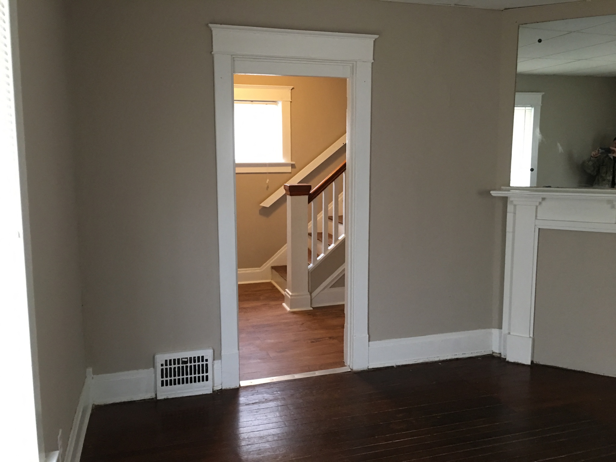 the view from the living room into the stairway to the office